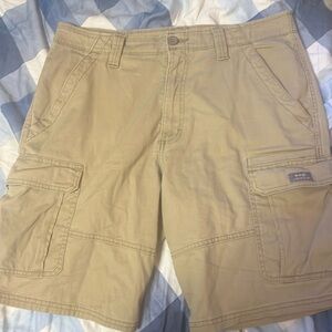 Tan Wrangler cargo shorts